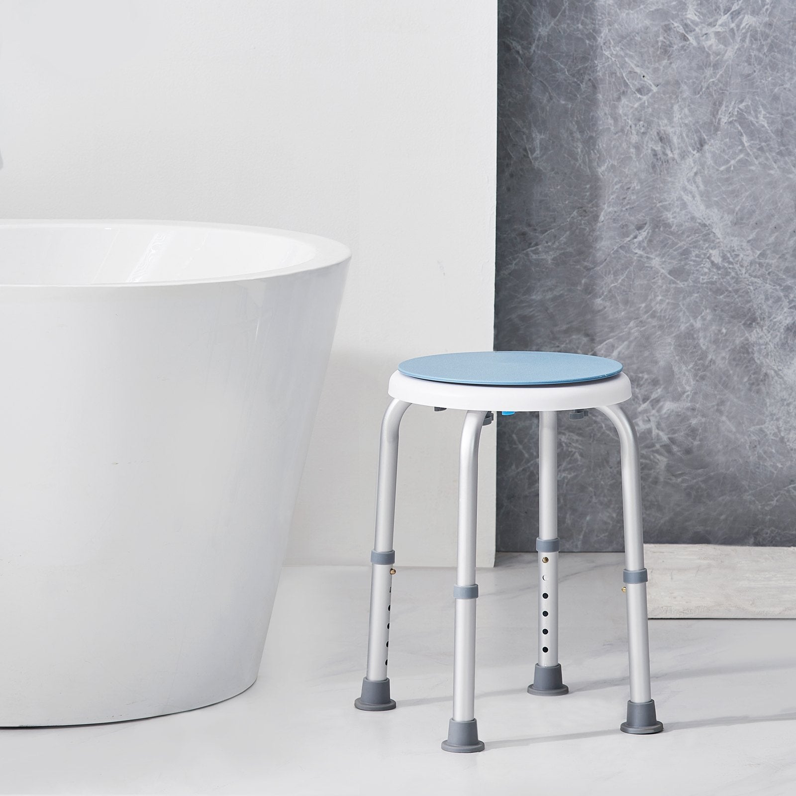 Shower stool beside bathtub for stable sit-down support with non-slip feet